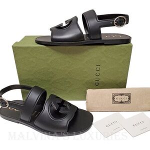 Gucci shoes men’s black leather cutout interlocking G logo sandals.